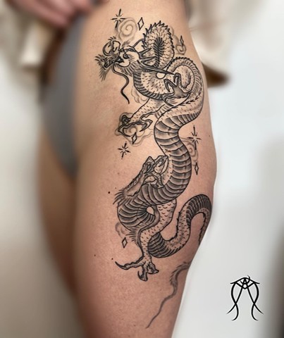 Intuitive Tattoo Art by Female New York Tattoo Artist Amanda Marie Of a cosmic dragon done in black and grey 
