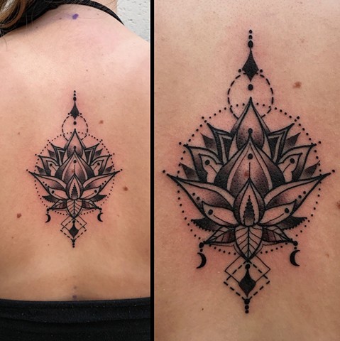 this is a geometric lotus tattoo done by Amanda Marie tattooer owner of ace of wands private tattoo studio in San Pedro California Los Angeles county 
