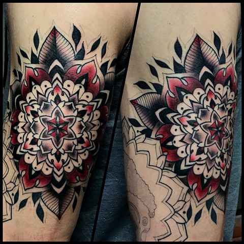 this is a red mandala tattoo that is geometric and inspired by sacred geometry done by amanda marie tattooer at ace of wands intimate private tattoo studio in los angeles california san pedro palos verdes 