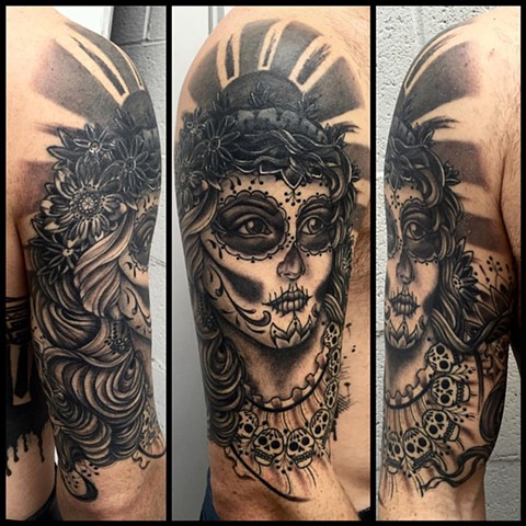 This is a tattoo of a day of the dead dia de los muertos lady head done in black and grey by amanda marie tattooer in los angeles california at evermore tattoo 