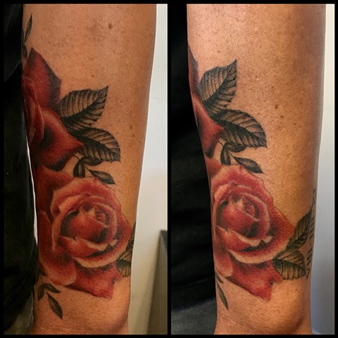 this is a tattoo of a realistic red rose done by amanda marie tattooer at ace of wands intimate private tattoo studio in san pedro los angeles california 