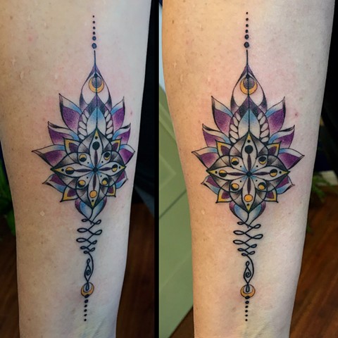 this is a lotus unalome tattoo done in color by Amanda Marie tattooer it includes moon symbolism and was done in Los Angeles San Pedro California at private tattoo studio and sacred space ace of wands tattoo 