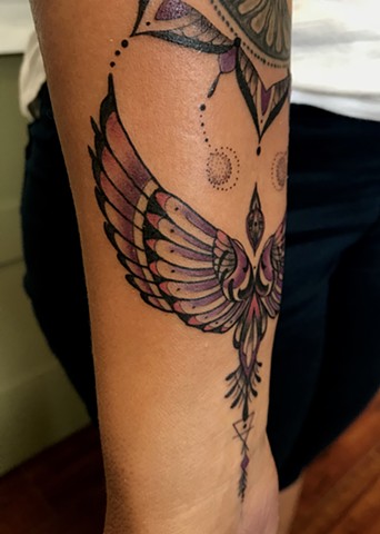 this is a tattoo done in a ornamental style that is ornate and delicate of an eagle done by Amanda Marie tattooer at ace of wands in Los Angeles San Pedro California 