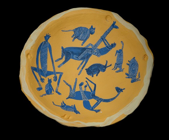 Yellow bowl with figures