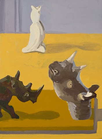 painting, two toy rhinos and a pie bird