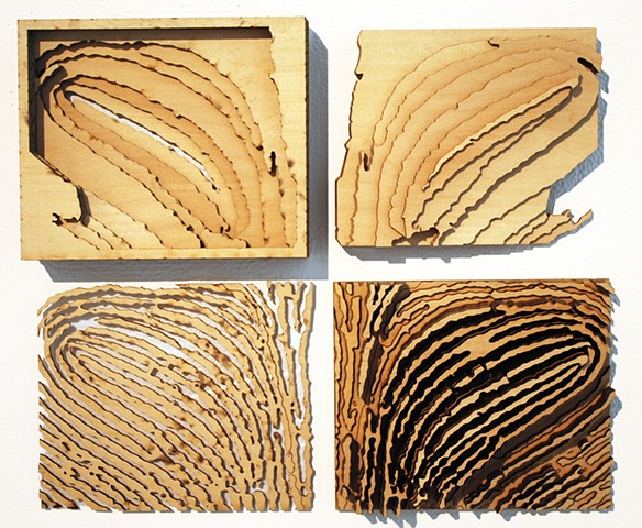 Wooden sculpture based on fingerprint by Janet Williams
