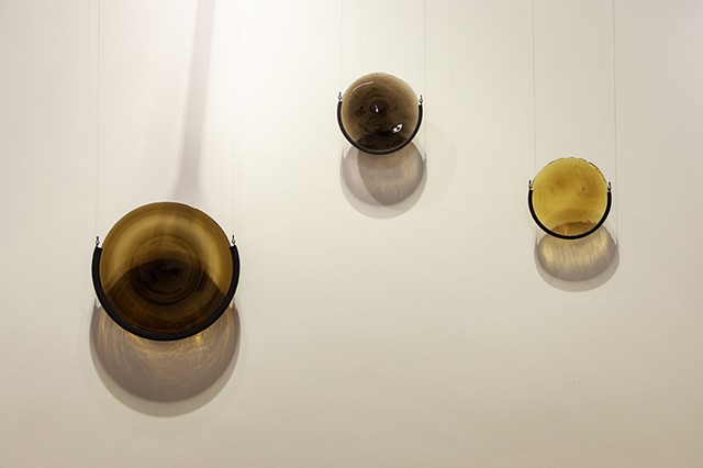 John Storey Concentrik Cluster 2026 Mouth blown glass rondels, zinc 14”, 8”, and 8” round Installation dimensions variable