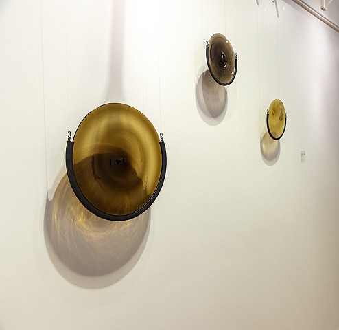 John Storey Concentrik Cluster 2026 Mouth blown glass rondels, zinc 14”, 8”, and 8” round Installation dimensions variable