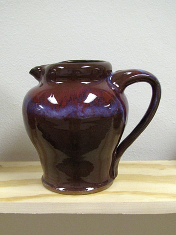copper red pottery exhibition pitcher