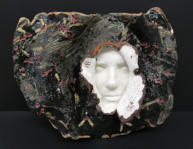 Student work, ceramics 1, face casting