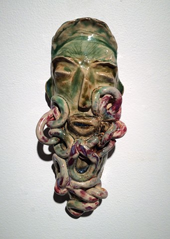 Ceramic mask, chains, glaze, cone 6 stoneware