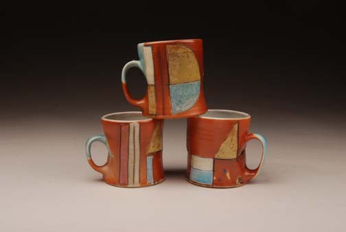 salt fired, decorated mugs