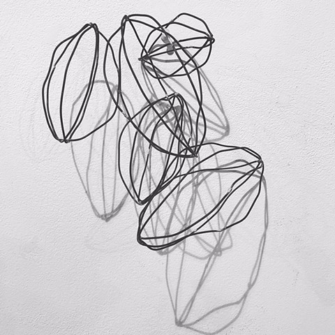 wire sculpture annealed steel negative space and shadows