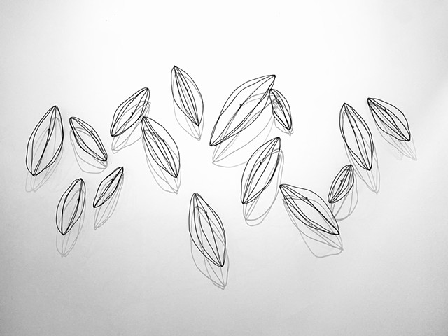 Contemporary minimal modern wall sculpture seed pods black wire modern contemporary shadows