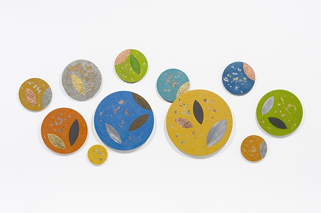 Spring colorful aluminum mixed-media wall sculpture seeds and leaves metallic circle art installation