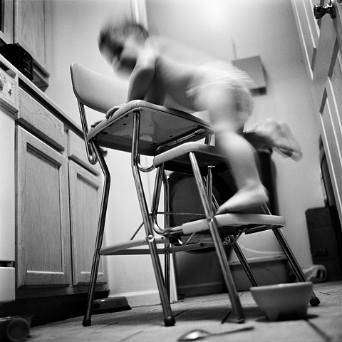 boy on chair moving