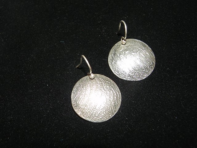 Reticulated and fold formed silver and brass bimetal earrings; patinated