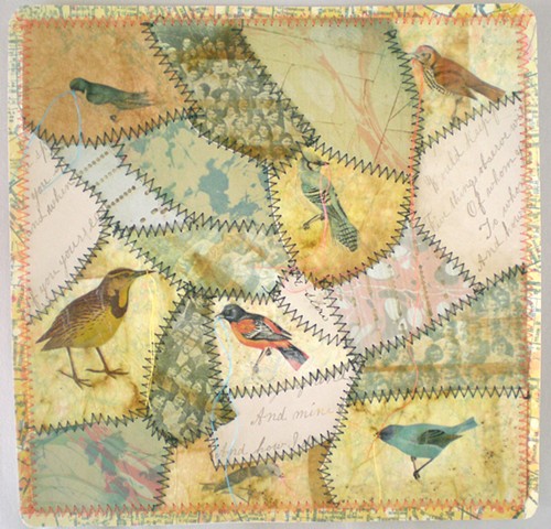 A paper quilt with images of birds