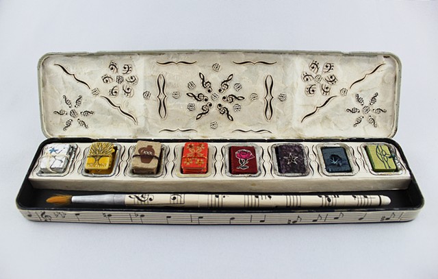 paint box, found object books, miniature books within a paintbox