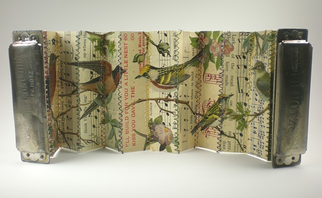 found object book, song birds, vintage harmonica