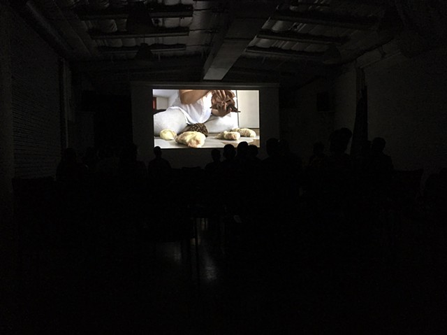 Documentation of screening ('My Own Sorrow(s)' by Melissa Tran featured on screen)