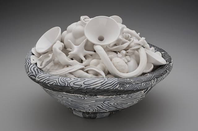 black and white bowl with white contents