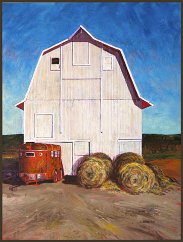 Large white barn, rusty red horse trailer, rolls of hay, bright blue sky