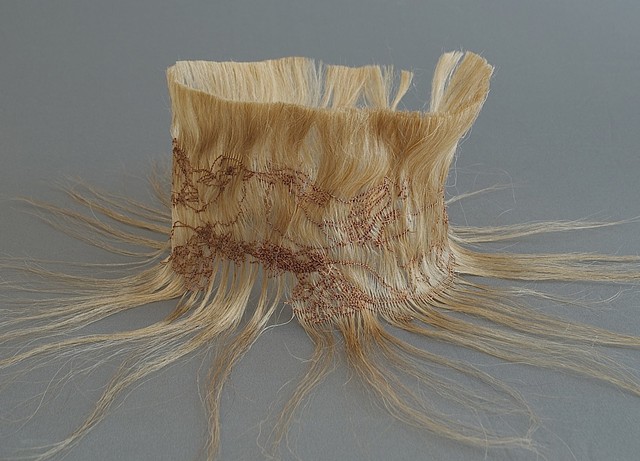 crown of human hair, human hair sculpture