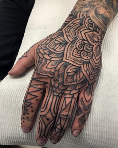 Thai style hand tattoo by Alvaro Flores Tattooer at La Flor Sagrada Tattoo Melbourne 
