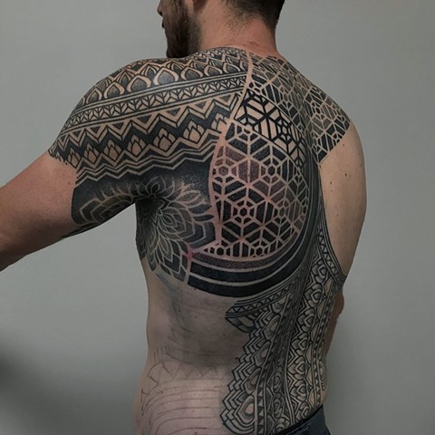 Back piece geometric mixed pattern in progress by Alvaro Flores Tattooer from La Flor Sagrada Tattoo Melbourne Australia