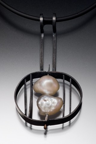 Two pearl oval pendant