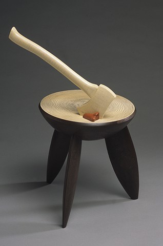stool with axe in top