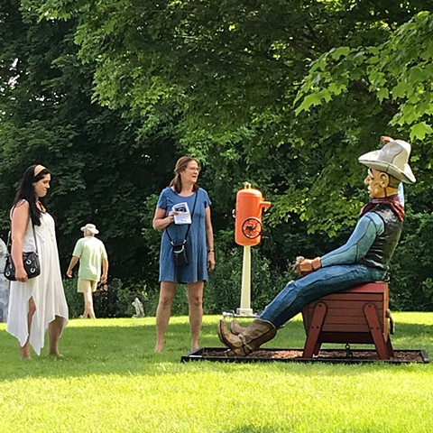 Buckaroo, cowboy, rodeo, bucking bronco, outdoor sculpture.