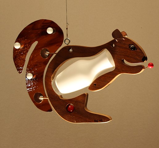 Hanging squirrel sculpture 