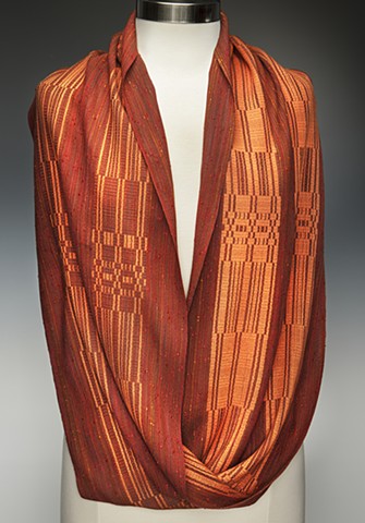 Mobius-shaped handwoven shawl with Muga silk