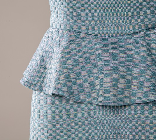 Detail of handwoven fabric for Monk's Belt Peplum Dress