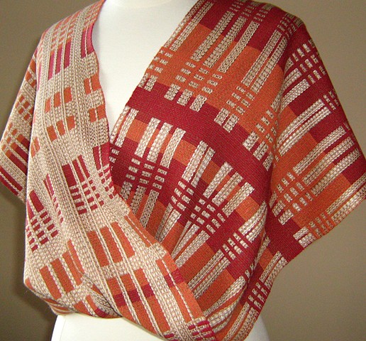 Handwoven mobius shawl in turned extended summer and winter. Variation on Missouri Check design by Atwater, in a style reminiscent of Wright architecture.