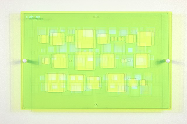 Green and blue laser-cut acrylic template with geometric pattern based on pi by Yvette Kaiser Smith