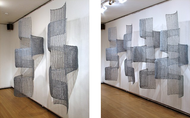Organic geometric grid crocheted fiberglass and polyester resin wall sculpture based on Pi by Yvette Kaiser Smith
