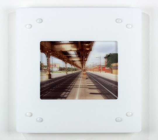 Digital pigment print on acrylic with laser-cut acrylic of urban setting by Yvette Kaiser Smith