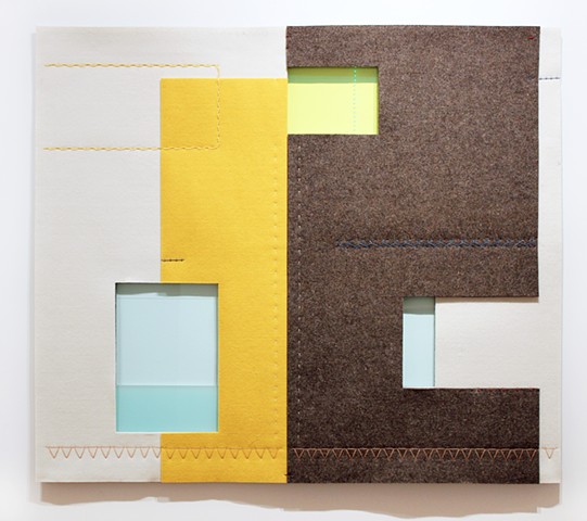 Grey, yellow, white, and blue industrial felt and plastic wall art by Yvette Kaiser Smith