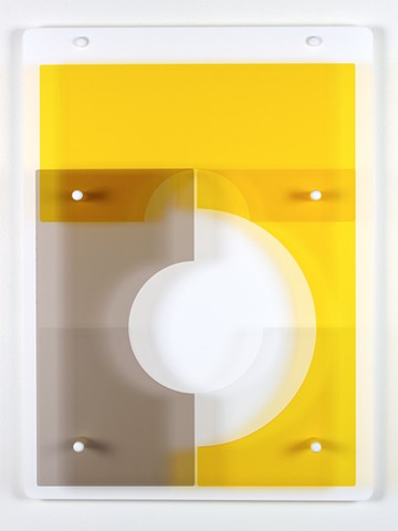 Geometric abstraction in laser-cut acrylic, white, brown, and yellow based on pi by Yvette Kaiser Smith