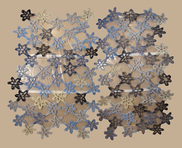 Crocheted fiberglass and polyester resin flower grid wall sculpture by Yvette Kaiser Smith