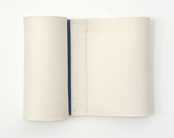 Off white wall hung sculpural felt with blue stripe