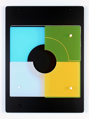 Black, white, yellow and blue laser cut acrylic geometric abstraction based on pi by Yvette Kaiser Smith