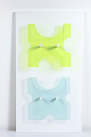 Geometric green and blue laser-cut acrylic sheet with spacers by Yvette Kaiser Smith