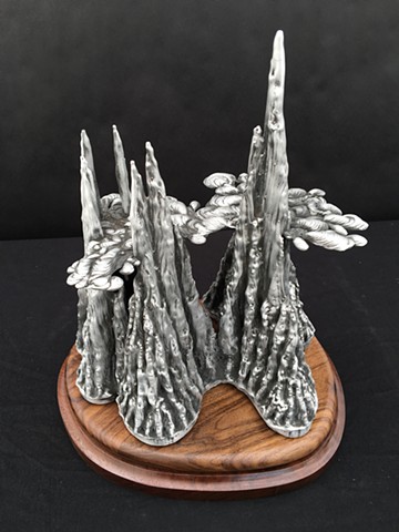 aluminum sculpture stalactite stalagmite contemporary art artist foundry