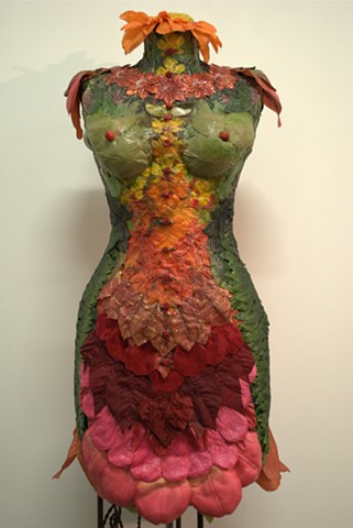 Body Form Decorated with Leaves, Flowers and Fabric.