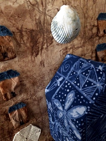 Close up to show indigo dyed batik on The Big House centerpiece of a triptych.  