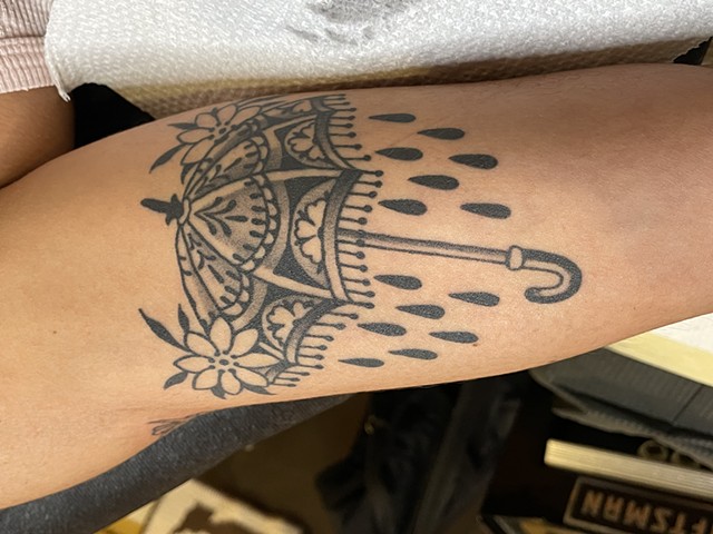Rainy umbrella tattoo by Alecia Thomasson